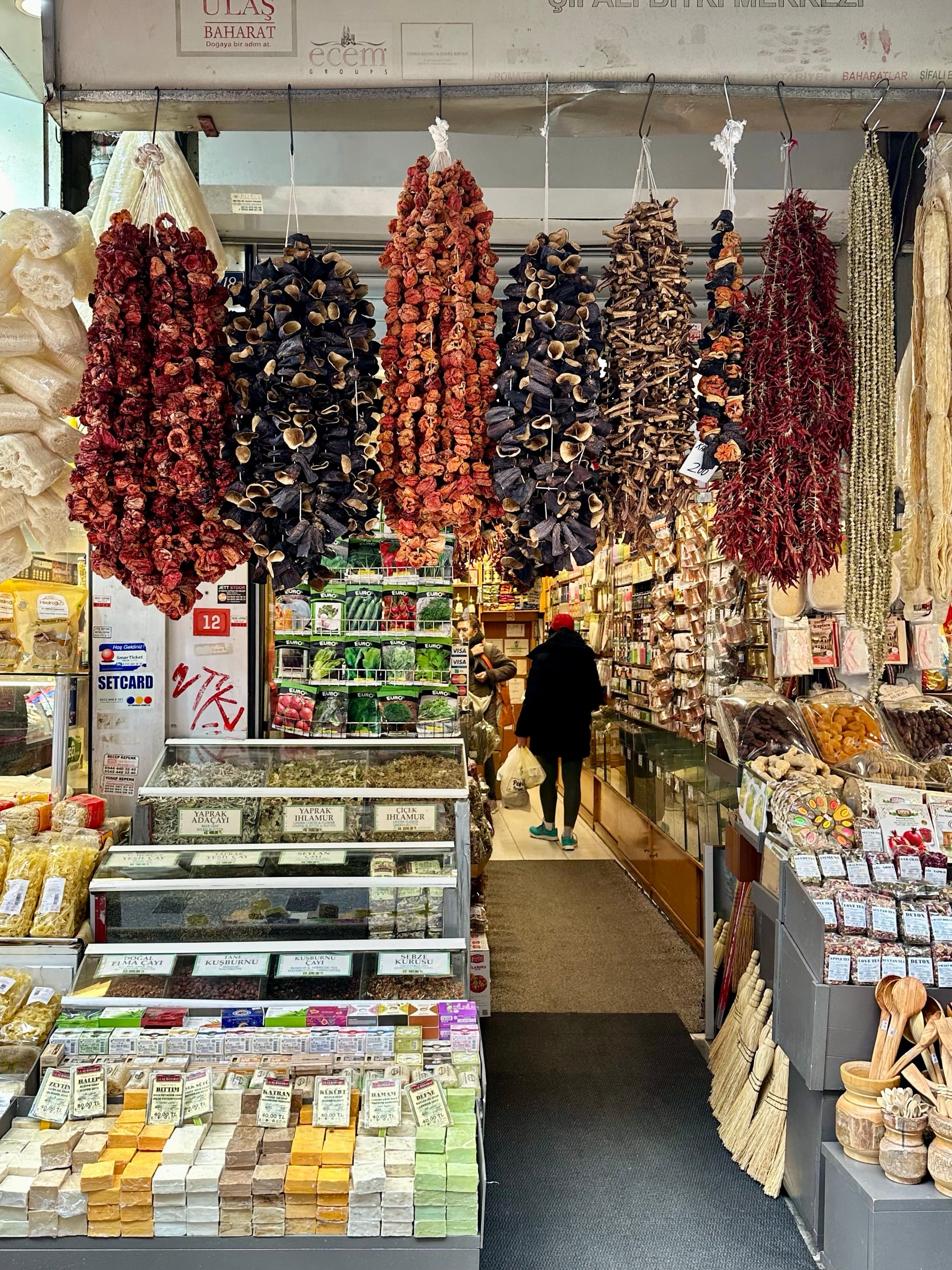 A traditional Istanbul spice and dried-goods shop hung with peppers