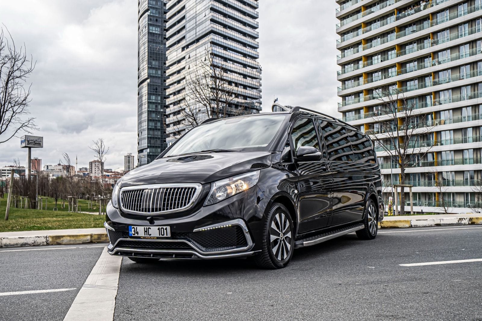 A black chauffeured Mercedes Vito luxury van parked on an Istanbul street, ready for a private airport transfer